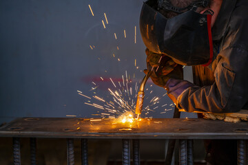 Welding of metal structures by semi-automatic arc welding. MIG welding.