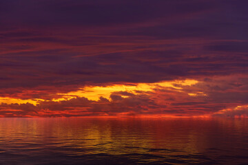 Seascape with red dramatic sunset
