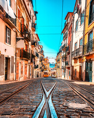 Golden hour image of the historic counter weight tram system, transporting up and down the steeps hills of Lisbon, Portugal