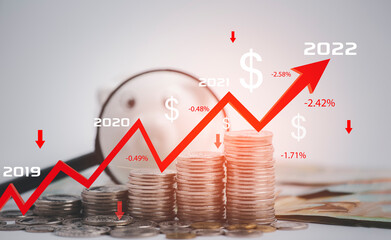 Coins stack and  Piggy  Bank with line red arrow graph business  on white background, Saving  ideas and  investment budget, debt money 2019-2022 concept, Business losses and debt problems