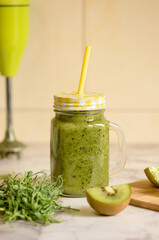 Green smoothie made from kiwi and pea sprouts.