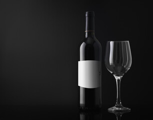 wine bottle with an empty glass