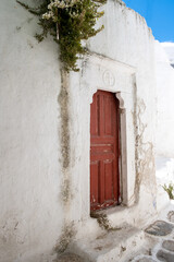 Mykonos island, Old church entrance door at Chora town. Greece, Cyclades.