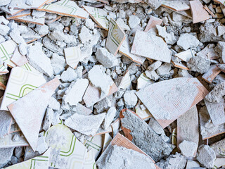Background made with bathroom tile rubble, concrete and other demolition remains.