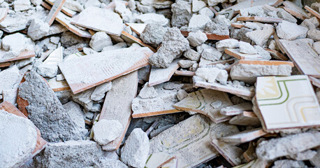 Background made with bathroom tile rubble, concrete and other demolition remains.