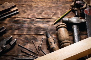 Construction work tools on the carpenter workbench background with copy space.