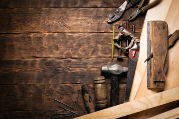 Construction work tools on the carpenter workbench flat lay background with copy space.