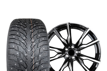 Car alloy wheel and tyre isolated on white background. New alloy wheel with tire for a car on a...