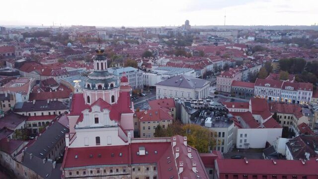 Tower And Exterior Of Church of St. Casimir In Vilnius City, Lithuania At Dusk. aerial orbit, 4k