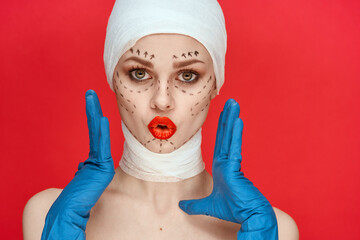 a person Red lips plastic surgery operation bare shoulders red background