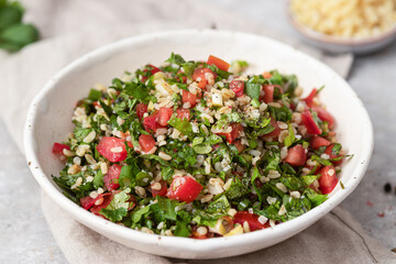 Fresh  tabbouleh salad with  parsley, mint, bulgur, tomato. Traditional middle eastern or arab dish