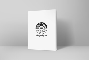 Fototapeta na wymiar White paper book in bright interior. Vector mockup. Place your logo double clicked on a sample LOGO