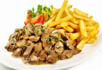 Sliced Meat Zurich Style with French Fries Isolated on white Background
