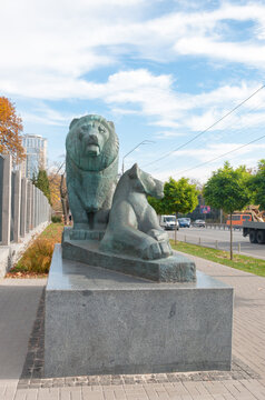 Kyiv, Ukraine - 10/21/2021: Kyiv Zoo. Sculpture of a lion and a lioness at the entrance to the zoo. Quality image for your project