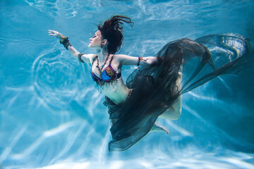girl dancing underwater