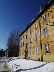 yellow house against the sky
