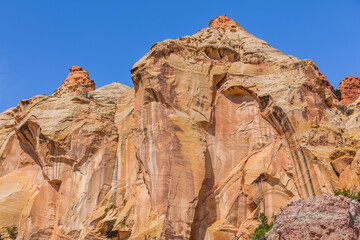 Amazing rock landscape. Orange rock slopes. Scenic view of the canyon. Beautiful view of the Burr trail road, Utah, USA