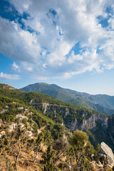 Fototapeta na wymiar Turkey sea and mountain landscape photo, mediterranean Turkish coast area near Fethiye, taken on Lycian way hiking route. Nature, outdoor, hiking and trekking concept image 