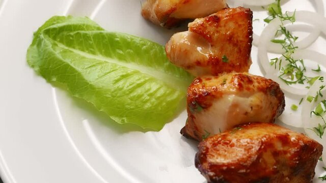 Chicken barbecue shish kebab for dinner. Nice grilled meat food rotating