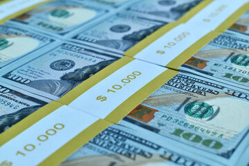 Close up of bundles of one hundred dollar bills.