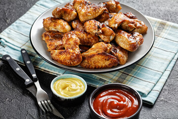 crispy fried chicken wings served on a plate
