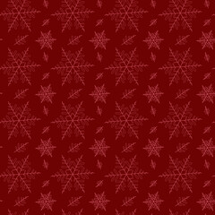 Seamless winter pattern of pink snowflakes on a red background for packaging and decoration