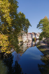 Fototapeta premium France, Strasbourg, old buildings at riverside