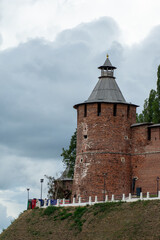 The tower of the Nizhny Novgorod Kremlin made of red brick