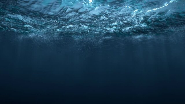 View of the waves of the stormy sea from under the water. Seamlessly looped video.