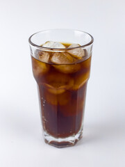 glass of cola with Ice Cubes on white background