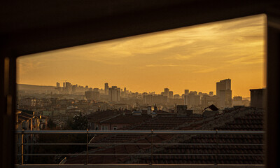 Fototapeta na wymiar City sunset view out the window, terrace balcony, ankara