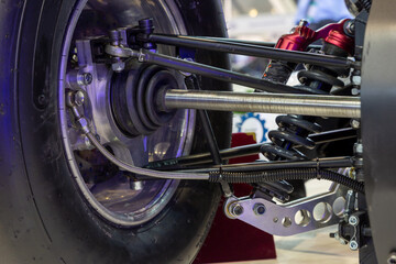 Technical photo. The structure of the modern car. Rear suspension. Shock absorber. Spring...