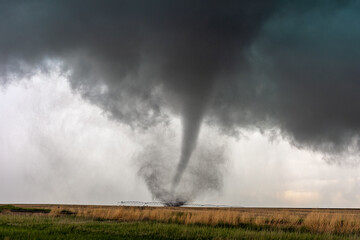 Fototapeta na wymiar Tornado in a field