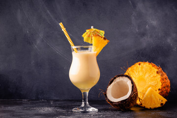 Traditional caribbean cocktail pina colada in a glass.