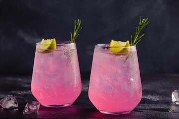 Refreshing pink drink or cocktail with ice