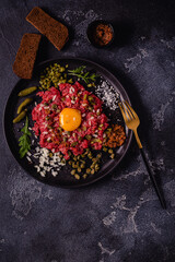 fresh beef tartar with tasty vegetables