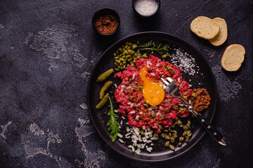fresh beef tartar with tasty vegetables