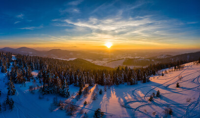 Picturesque winter panorama of mountain hills