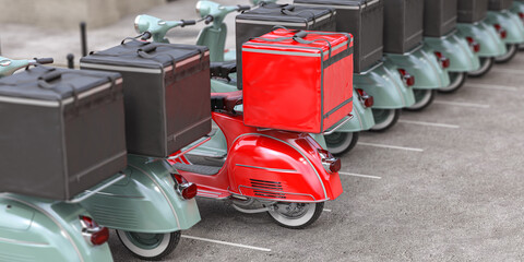 Red delivery scooter with delivery bag in a row of mopeds of grey color. Fast express delivery concept.