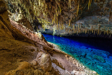 Abismo anhumas, cave with underground lake, Bonito national park, Mato Grosso Do Sul, Brazil - obrazy, fototapety, plakaty