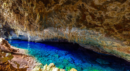 Abismo anhumas, cave with underground lake, Bonito national park, Mato Grosso Do Sul, Brazil - obrazy, fototapety, plakaty