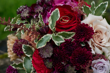 wedding rings on flowers