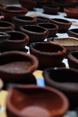Artistic homemade clay oil lamps are ready for diwali and other festivals