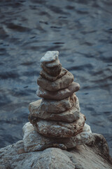 Zen stones against blue sea