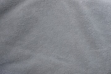 gray fabric texture from a piece of wool  matter on the cloth