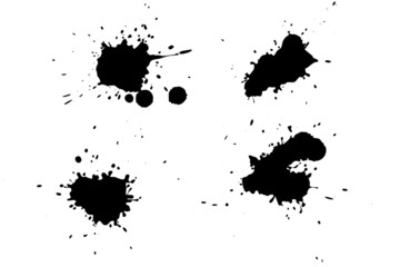 Black blot on a white background. Spots of ink on a piece of paper.