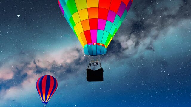 Vibrant, glowing hot air balloons against dark night sky rising over mountains.