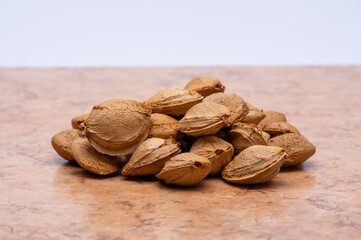 plum pits on a  tile