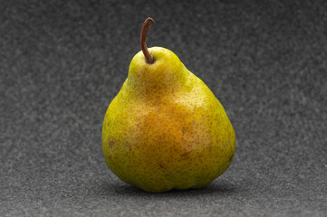 Pear Pakham with golden side   on a fleecy backdrop