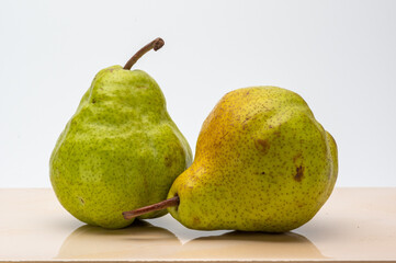 Two Pears Pakham with white background on cream  tile
